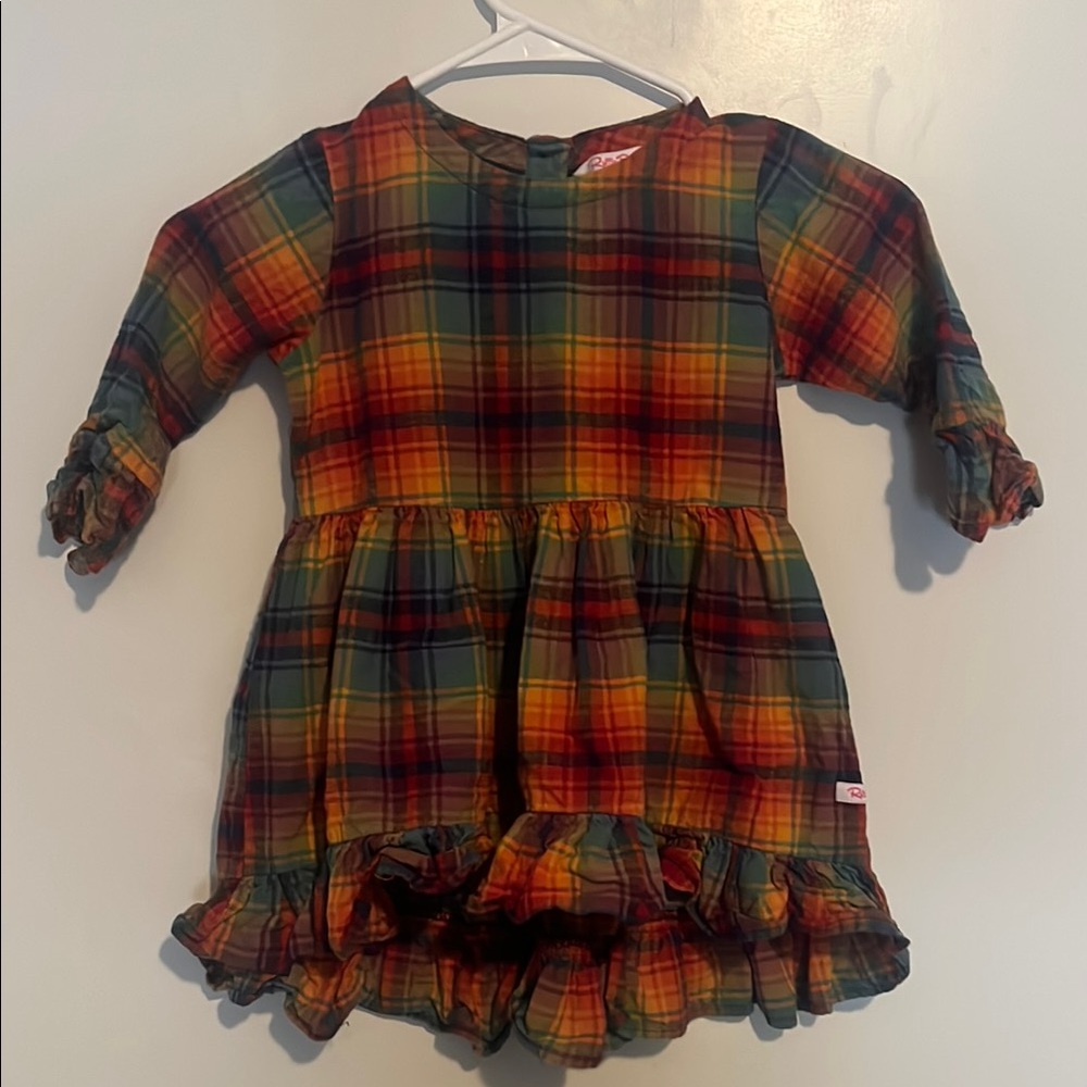 Vibrant plaid ruffle butts dress